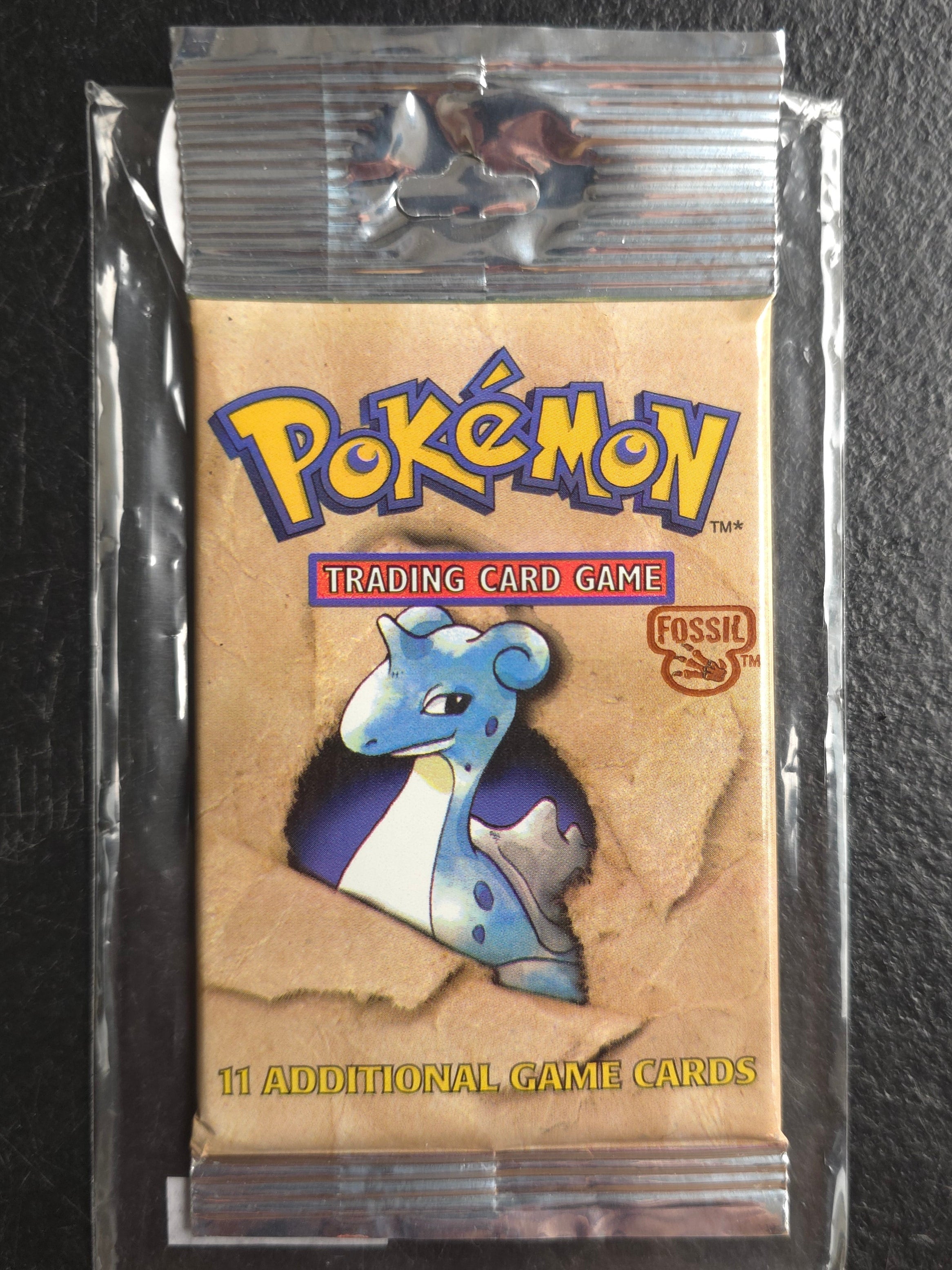 Pokémon Fossil Booster Pack - Unlimited Edition (1999) - Long Crimp - Lapras - Image 1